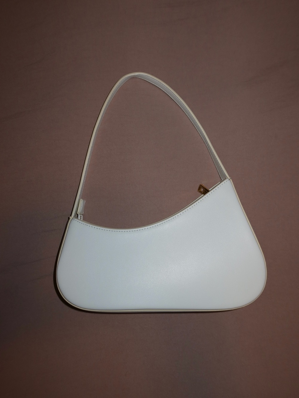 Aupen Minimalist White Shoulder Bag with Curved Silhouette